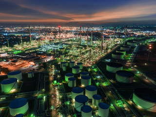 Oil refinery factory with beautiful sky at dusk for energy or gas industry or transportation background. - 239158382