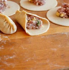 Making dumplings manti