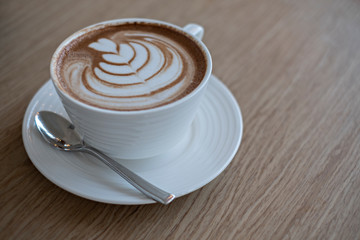 Cup of coffee latte art.