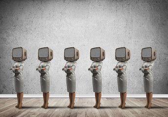 Business women with old TV instead of head.
