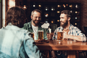 Cheerful friends with drinks and speech bubble spending time at pub