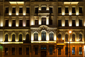 St. Petersburg facade of the historical building in Baroque style, night illumination, Neva...