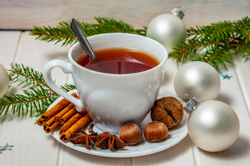the christmas still life with biscuits and the cup of tea