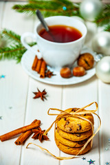the christmas still life with biscuits and the cup of tea