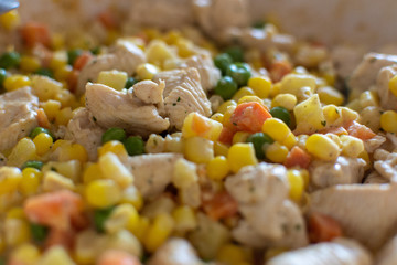 Chicken meat, green beans, corn and carrots