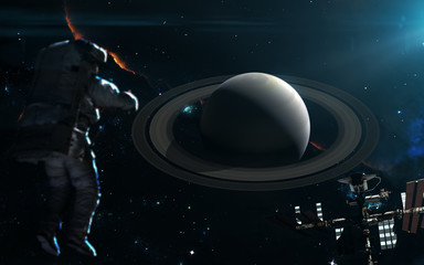 Planet Saturn in blue light. Solar system. Science fiction art. Elements of the image were...