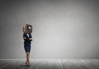 Business woman with an old TV instead of head.