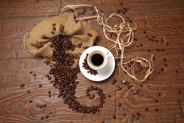 White cup of coffee with beans