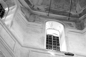 wrought iron bars on the windows in the old church