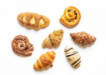 Top view of bread and bakery set on white color background.Food and healthy concepts