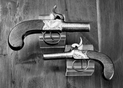 Antique English Percision Muff Pistols.