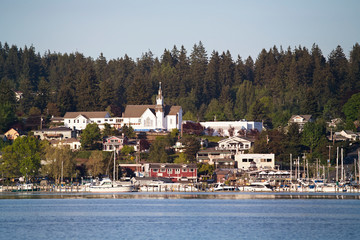 quaint town of poulsbo, washington reflecting in the bay