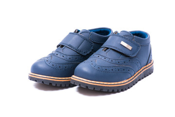 Blue baby shoes isolated on white background