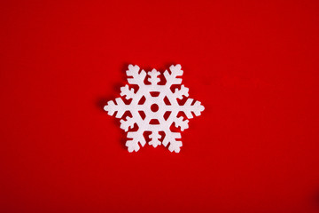 snow flake on red background , theme for new year