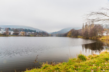 beautiful image of Doyards lake in Vielsalm on a cold winter morning in the Belgian Ardennes