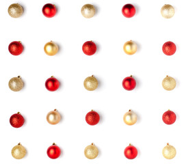 Christmas or winter composition. Pattern made of red and golden balls on white background. Christmas, winter, new year concept. Flat lay, top view, copy space