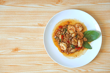 close up fried chopped pork and shrimp with sweet basil Thai style tasty dish with copy space for text