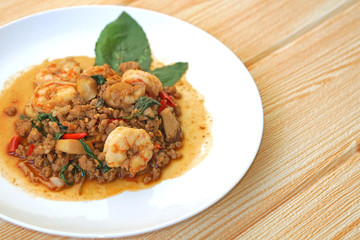 close up fried chopped pork and shrimp with sweet basil Thai style tasty dish with copy space for text