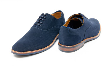 Blue suede shoes isolated on white background
