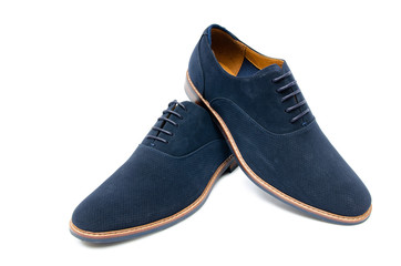 Blue suede shoes isolated on white background