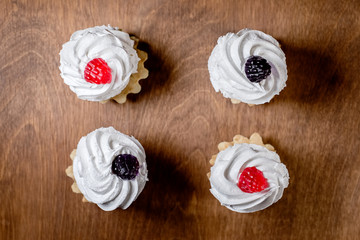 protein cakes basket with berries. view from above