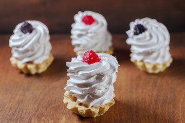 protein cakes basket with berries on table