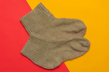 flat lay of winter warm clothes supplies on color background f