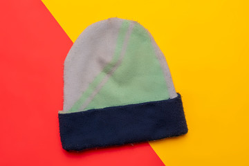 flat lay of winter warm clothes supplies on color background f