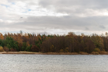 blue sky white clouds over calm body of water