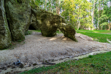 sandstone cliffs with tourist trail on river of gauja, Latvia