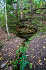 sandstone cliffs with tourist trail on river of gauja, Latvia