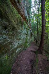 sandstone cliffs with tourist trail on river of gauja, Latvia