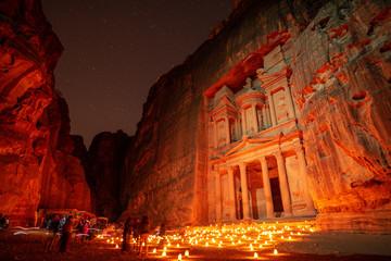 petra jordan the treasury by night candlelight  - obrazy, fototapety, plakaty
