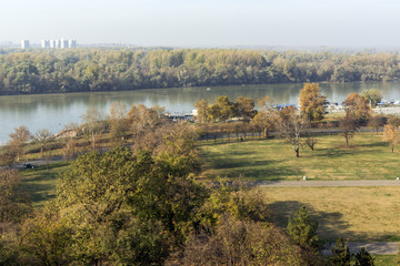 Fototapeta na wymiar Panoramic sunset view of Belgrade Fortress, Kalemegdan Park, Sava and Danube Rivers in city of Belgrade, Serbia