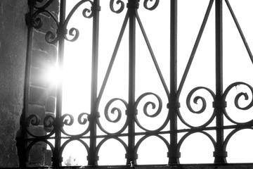 wrought iron bars on the windows in the old church