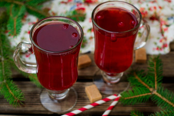 Warm sweet black tea with cranberries for winter © larik_malasha