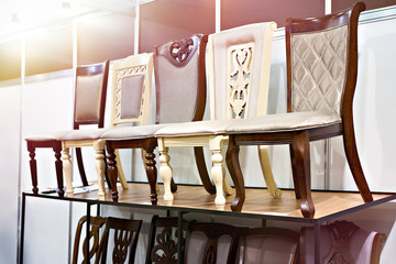 Fototapeta na wymiar Chairs in furniture store