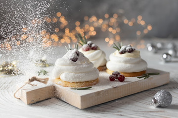 Pavlova Cake with berry cranberries on white background