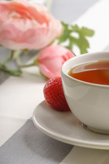 Fresh, tasty strawberries for breakfast on a light background.