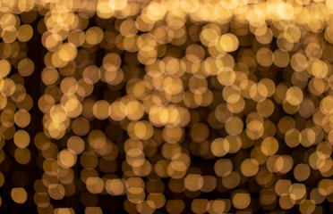 Gold abstract bokeh , light background.