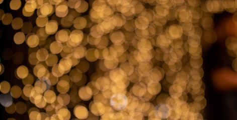 Gold abstract bokeh , light background.