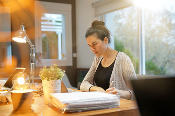 Attractive woman working in co working office space