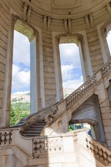 Fototapeta premium Padula, Italy - September 2018: The flight of steps of the cloister of the Certosa of San Lorenzo