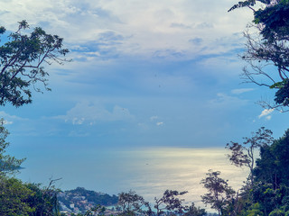 Beautiful view of the sea, where the sky in the clouds merges with the water. You can see the birds...