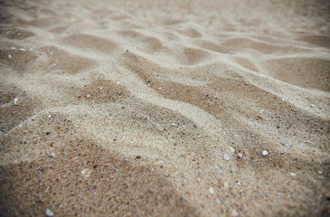 Fine beach sand in the summer sun