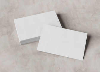 Stack of business card mockup on concrete 3d rendering