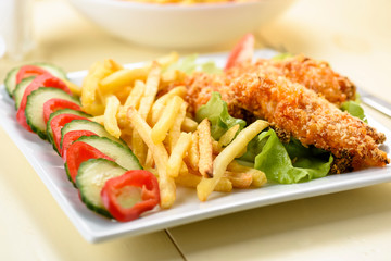 chicken strips and fries