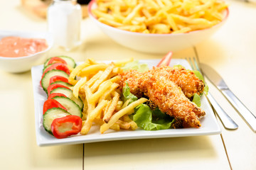 chicken strips and fries