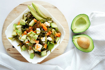 Recipe for avocado salad. Ingredients: sea kale, Adyghe cheese, boiled carrots, avocado