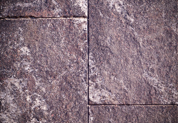 beige granite stone tiled background with vignette. architecture, texture.